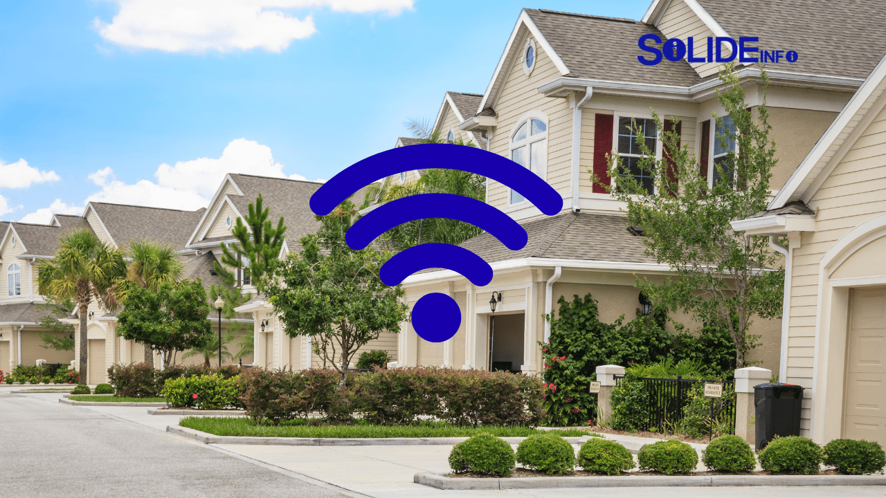 Xfinity vs Other Cable Internet Companies: Which Provider is Best Near You? 1 A city neighborhood with WiFi icons above houses, representing different cable internet providers and cable internet near me options.
